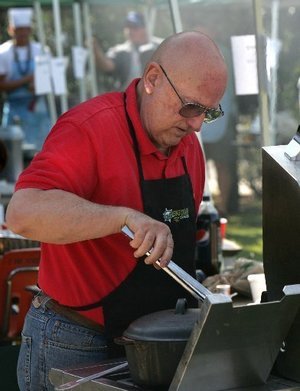 Jim cooks the chili.
